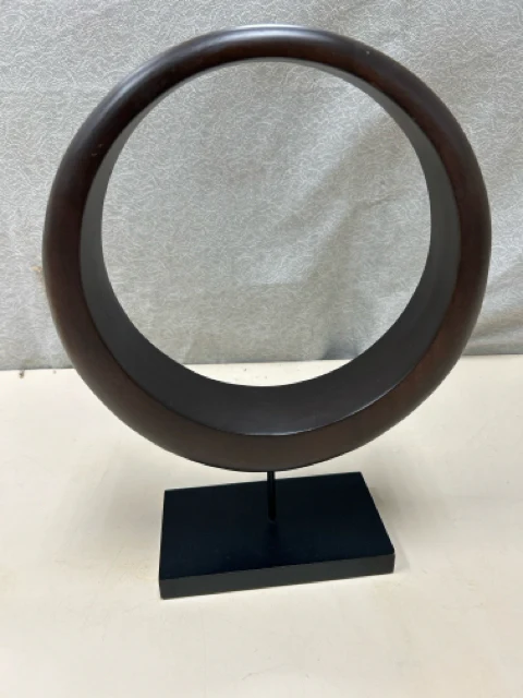 BROWN WOOD RING ON STAND