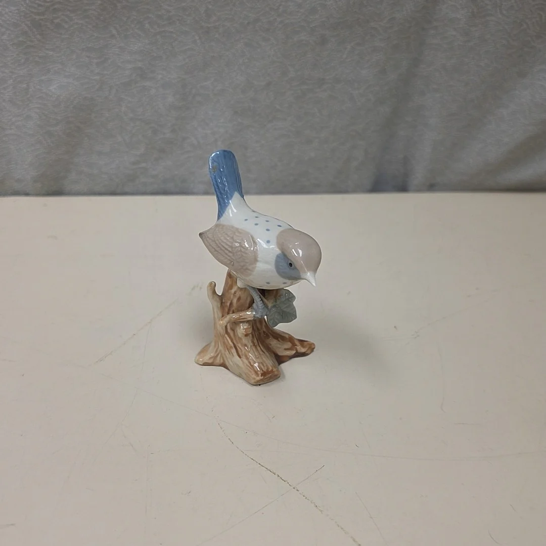 CERAMIC BIRD ON BRANCH