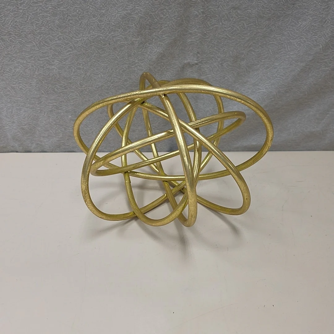 GOLD METAL KNOT SCULPTURE