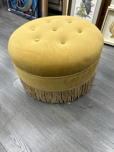 GOLD UPHOL OTTOMAN W/FRINGE