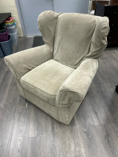 GREY SLIPCOVERED ARMCHAIR