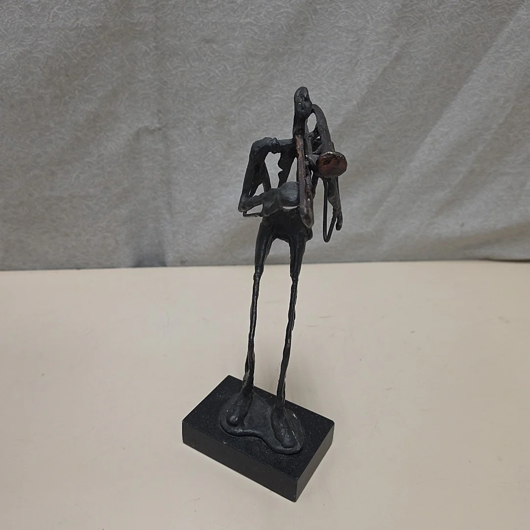 IRON MUSICIAN STATUE