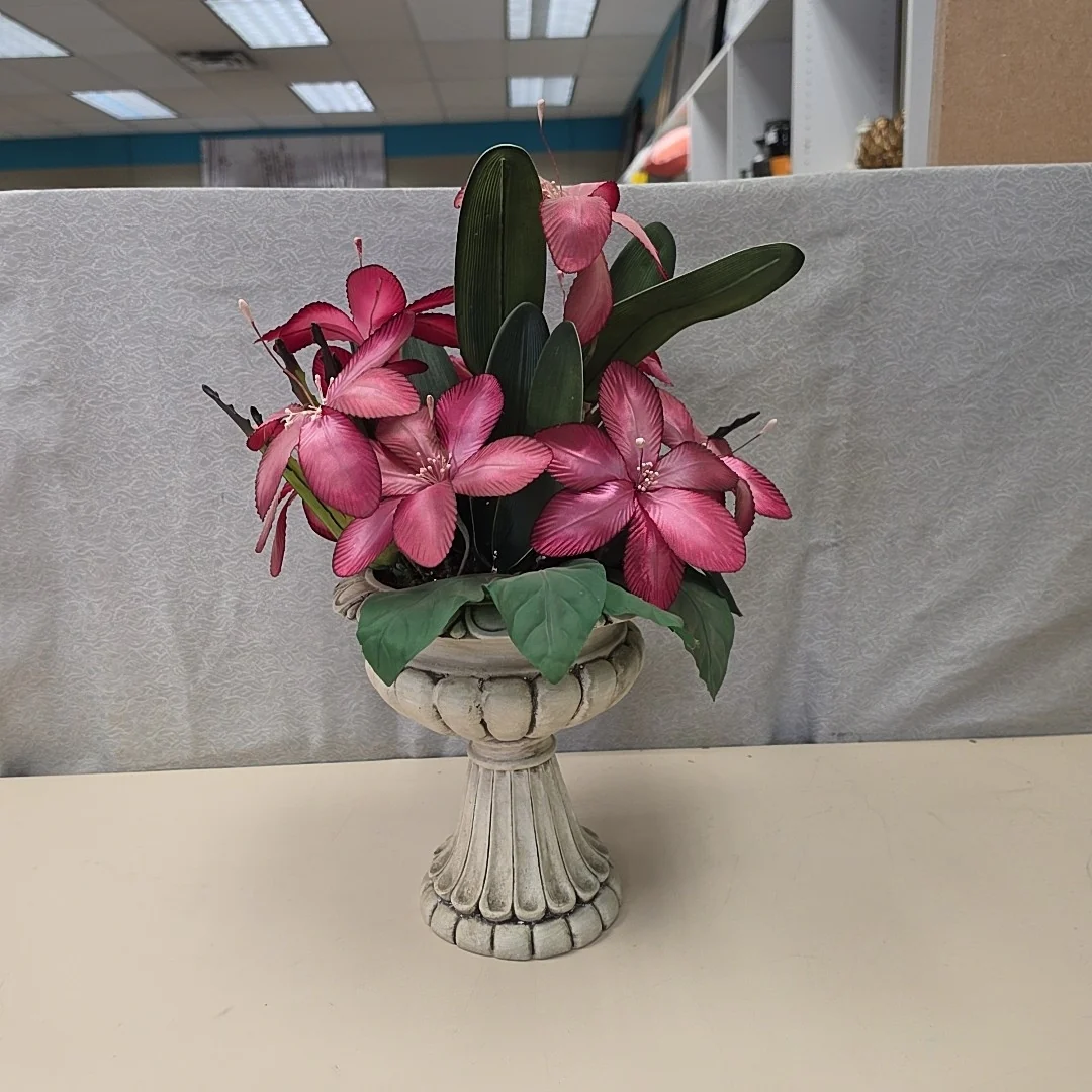 PINK FLOWERS IN Pedestal PLANTER
