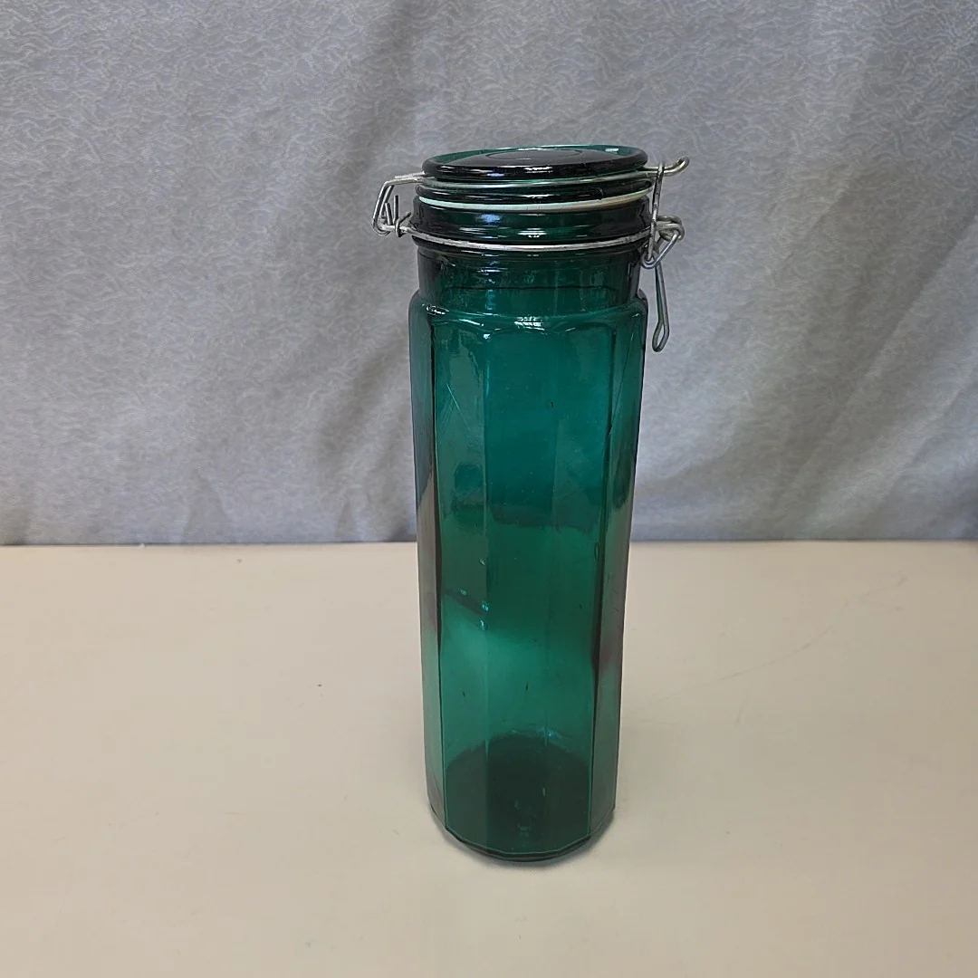 TALL GREEN GLASS CONT