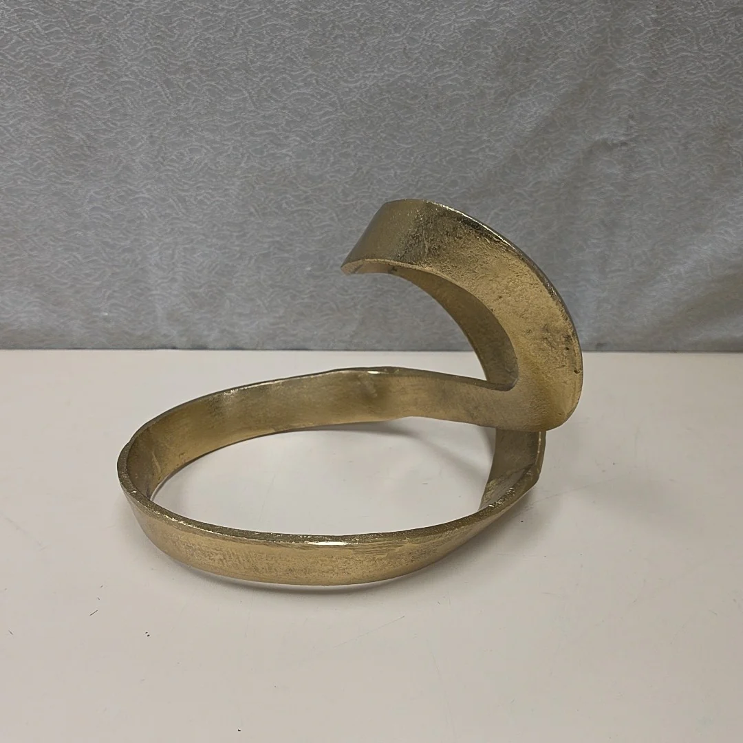 TWISTED GOLD METAL SCULPTURE