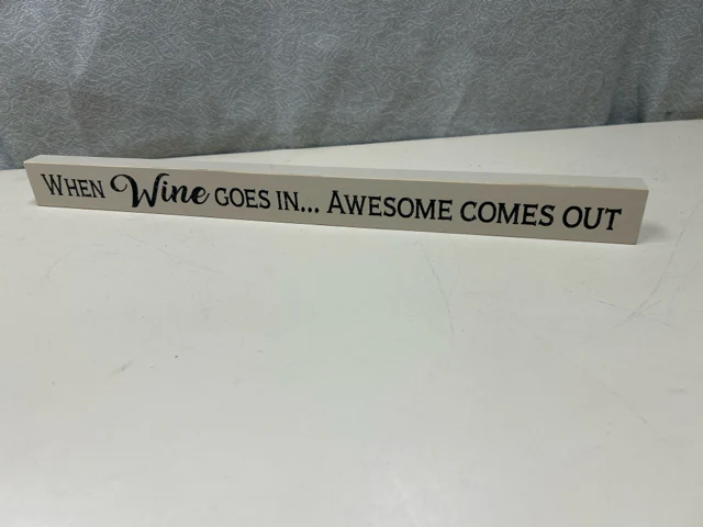 WHEN WINE GOES IN SIGN