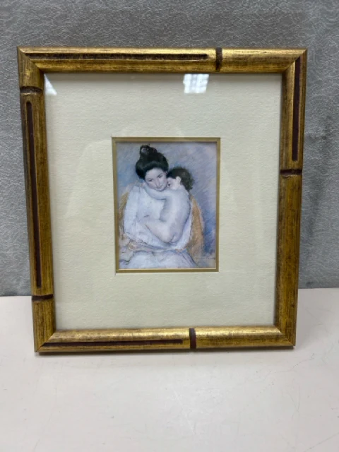 WOMAN HOLDING CHILD ART